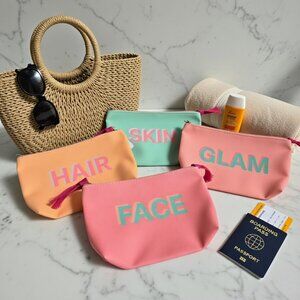 NWT 4 set travel bags, water resistant materials for make up or essentials